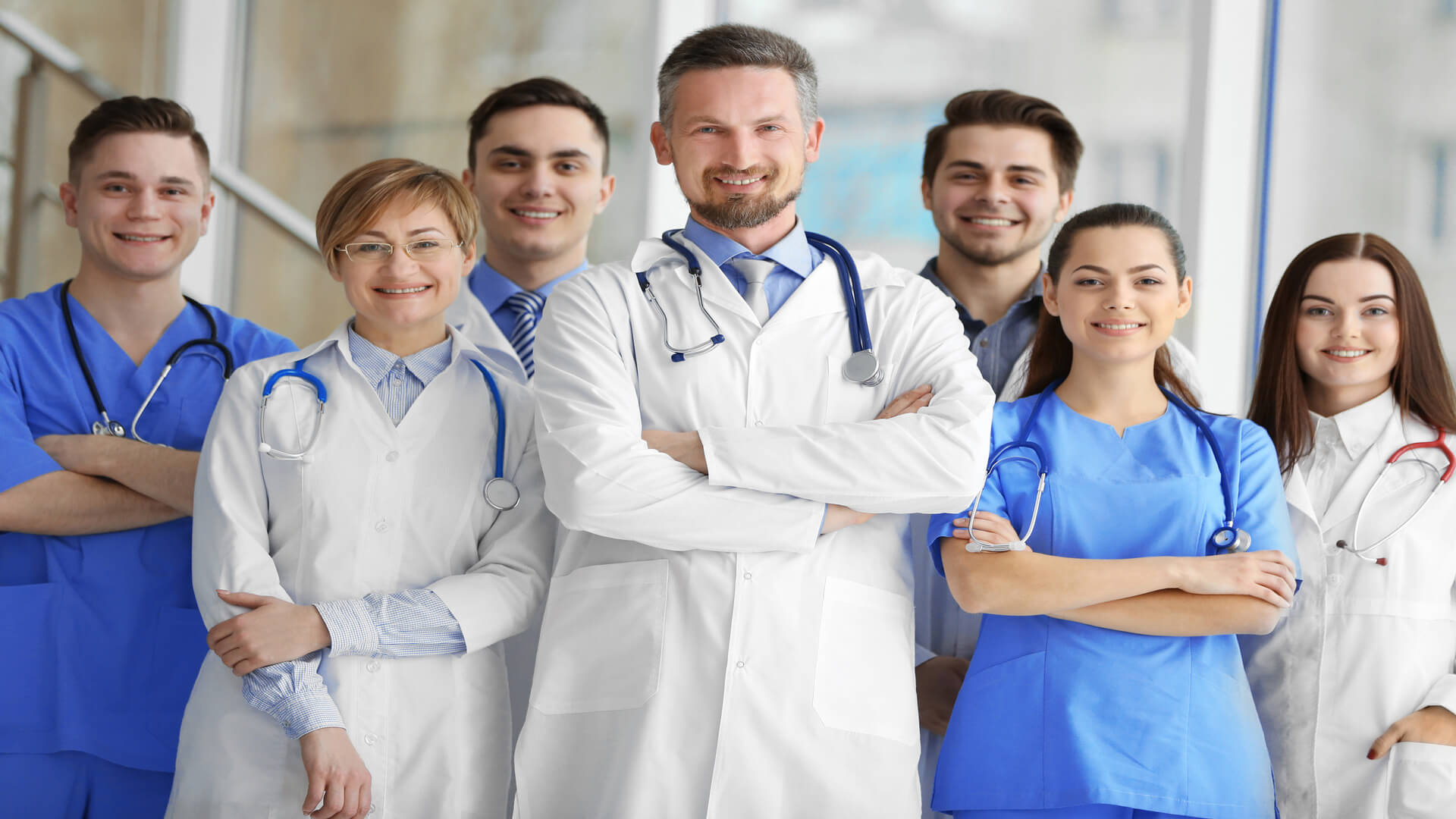 group-doctors-nurses-standing-hospital (1) (1)